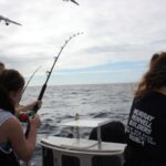 Triple hook up on Half Cast Charters boil hot with Tuna